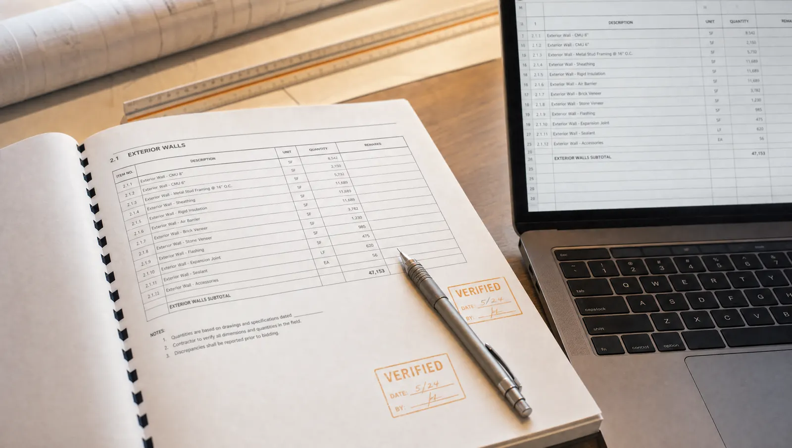 A bound takeoff report deliverable on a desk